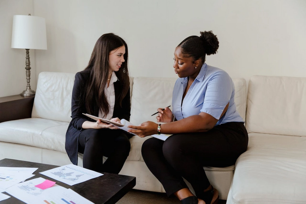Two women discussing business. How to know if you're ready for funding
