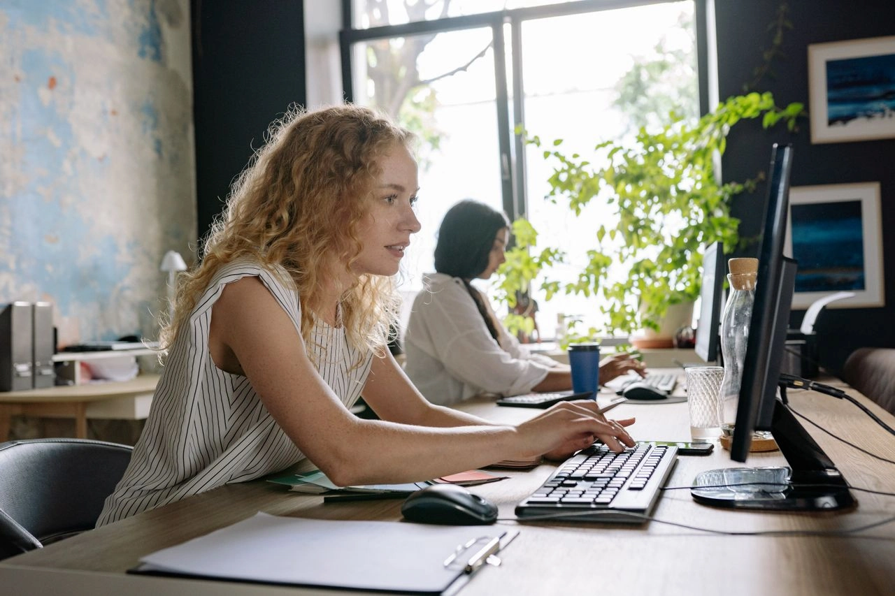 Two women working in a modern office environment. Funding Opportunities for Women Entrepreneurs in Ohio
